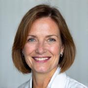 Porträt von Dr. Sarah Weber, einer freundlichen Ärztin.